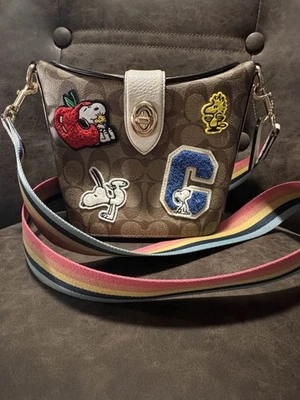  *NEW* Coach X Peanuts Addie Crossbody in Signature Canvas with Varsity Patches - Image 1 of 4