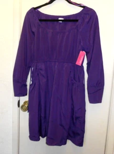 NUEVO Xhilaration. Vestido corto jersey morado con bolsillos talla M - Imagen 1 de 4