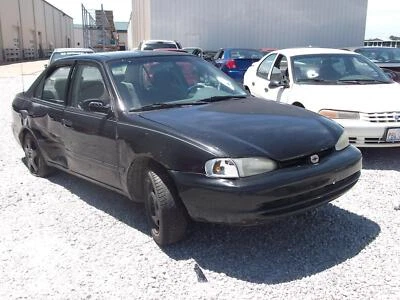 Puerta trasera izquierda vidrio usado se adapta: Chevrolet Prizm 1999 trasero izquierdo grado A Foto 1 de 4