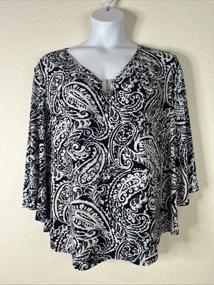 Top elástico cachemir azul manga 3/4 Cato para mujer talla grande 18/20W (1X) Foto 1 de 4