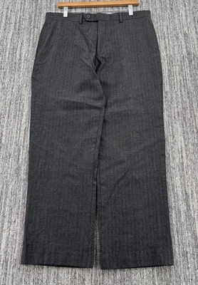 Pantalones sueltos grises de franela de lana tweed espiga 34x30 9” pierna para hombre Foto 1 de 4