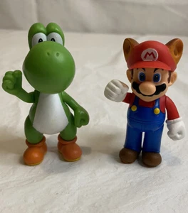 Jakks Pacific Nintendo Super Mario Bros Raccoon Mario 2.5" & Yoshi 3” Figures - Picture 1 of 3