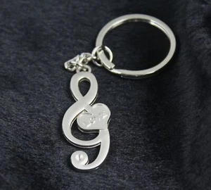 5x PZ - PORTACHIAVI PORTACHIAVI ANELLO CHIAVE ACUTA CUORE AMORE MUSICISTA REGALO - Foto 1 di 6