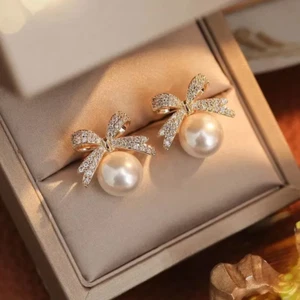 Women's Fashion Jewelry Gold Pearl Bow Stud Earrings 562 - Picture 1 of 5
