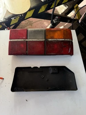 VOLVO 240 85-93 1985-1993 TAIL LIGHT PASSENGER RH RIGHT w/ BLACK TRIM BRIGHT - Image 1 of 4