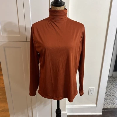 Top de mujer vintage años 70’s naranja óxido cremallera cuello tortuga manga larga hippy sedoso Foto 1 de 4