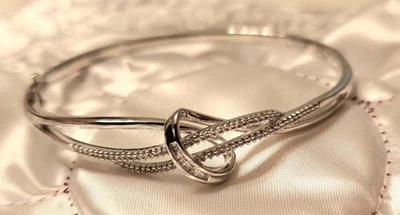 Diamantes Helzberg 1/4 ct. tw. Pulseira de diamante em prata esterlina - Imagem 1 de 4