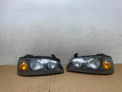 Juego de faros halógenos izquierda+derecha Hyundai Elantra 2004 2005 2006 V3026 DW Foto 1 de 4