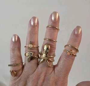 Juego de anillos 8 cristales dorados pulpo onda melocotón rango de tamaño 5 a 7 - Imagen 1 de 18