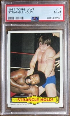 1985 Topps WWF Strangle Hold! Piper JYD PSA 9 - Image 1 of 2