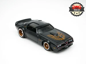 Pontiac Firebird T/a 1977 negro escala 1:64 modelo de coche de colección diecast - Imagen 1 de 10