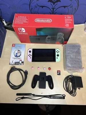 Nintendo Switch Konsole – Top Zustand + Animal Crossing  Joy Cons + 2 Spiele - Bild 1 von 4