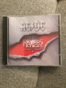 AC/DC *The Razor's Edge *CD *ATCO *D133379 *CLUB *VG+/VG+ *1990 *91413-2 *ROCK - Picture 1 of 4