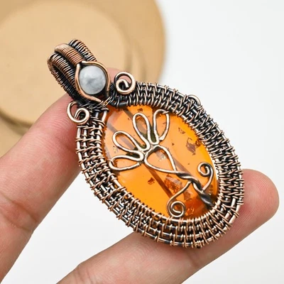 Delicado colgante hecho a mano con envoltura de alambre de cobre con piedras preciosas de ámbar báltico para regalo de Año Nuevo Foto 1 de 4