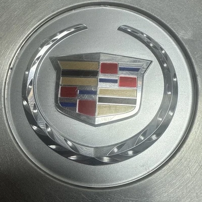 Tapacubos central de aluminio Cadillac DTS Seville OEM Foto 1 de 4