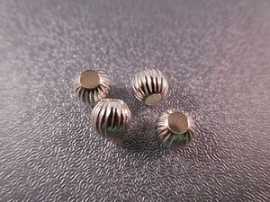 Espaciador de cuentas corrugadas redondas huecas de plata de ley 5 mm 4 piezas - Imagen 1 de 1