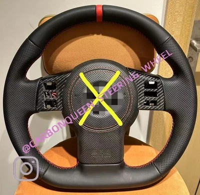  Volante CALEFACTABLE PARA NISSAN 350Z CON CUBIERTA DE BOTONES DE FIBRA DE CARBONO  Foto 1 de 4