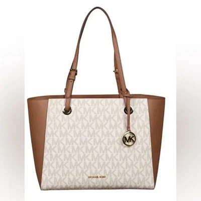 Bolso de Mano Michael Kors WALSH Equipaje Vainilla Precio de Venta sugerido por el fabricante $298.00 Nuevo sin Etiquetas SKU 196163144757 Foto 1 de 4