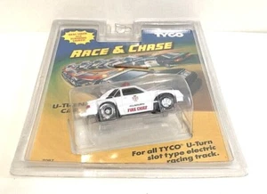 Tyco Race & Chase '79 Mustang Fire Chief 911 U-TURN Slotcar Nr. 7087 NOS - Bild 1 von 9