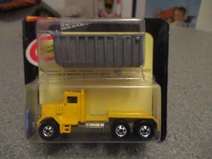HOT WHEELS peterbilt dump truck extras 1983 on cut card worldwide shipping - Bild 1 von 3