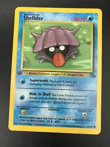 Shellder 1st Edition 54/62 Fossil Common Pokemon Vintage Card WOTC NM 1999 - Picture 1 of 2