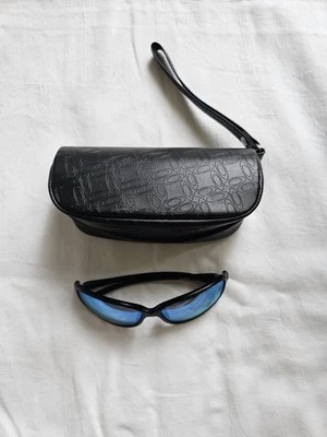 Gafas de sol y estuche Oakley Cohort para mujer recetadas  Foto 1 de 4