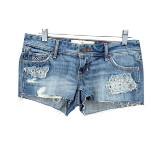 Pantalones Cortos de Denim Hollister Talla W25 Envejecidos Lentejuelas Adornados Tiro Bajo Azul Y2K - Imagen 1 de 12