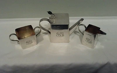 Juego de té de plata esterlina A Hukin, Heath, Middleton y Christopher Dresser Foto 1 de 4