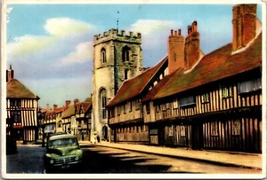 Vintage English Tudor Street Scene with Church Tower & Classic Car Postcard - Picture 1 of 3