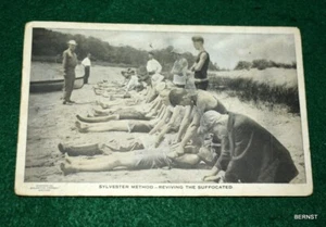 BOY SCOUT - OFFICIAL BOY SCOUT POSTCARD - BOY SCOUTS REVIVING THE SUFFOCATED - Picture 1 of 5