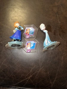 Disney Infinity 1.0 Frozen ElsaAnna Lote de 4 2 Figuras y 2 Discos de Poder Cristales - Imagen 1 de 2