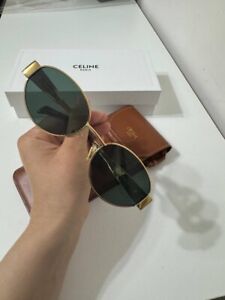 Celine CL40235U Triomphe metal sunglasses with gold frame and green lenses