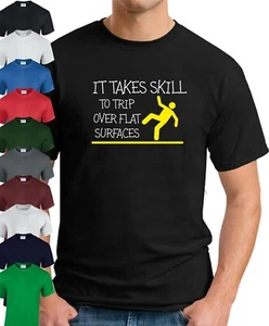 CAMISETA SE NECESITA HABILIDAD PARA TROPEZAR CON SUPERFICIES PLANAS > Divertido Eslogan Novedad Para Hombre - Imagen 1 de 22