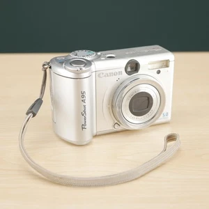 Canon PowerShot A95 5,0 megapixel fotocamera digitale - la modalità fotocamera si comporta come se il tappo dell'obiettivo fosse acceso - Foto 1 di 15