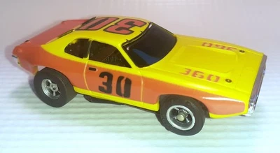 Vintage Aurora AFX PLYMOUTH ROADRUNNER Slot Car Yellow/orange #30  Runs!!! - image 1 of 4