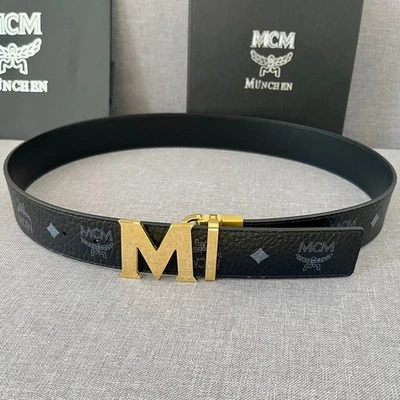 Cinturón reversible MCM, negro con logotipo dorado, talla 100 estilo hombre Foto 1 de 4