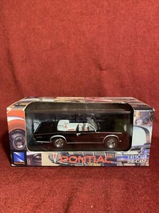 New Ray1966 Pontiac GTO Convertible City Cruiser schwarz/grau Diecast 1:43 NEU - Bild 1 von 4
