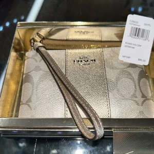 Muñequera Coach metálica con cremallera en la esquina con rayas platino nueva con etiquetas y caja dorada - Imagen 1 de 5