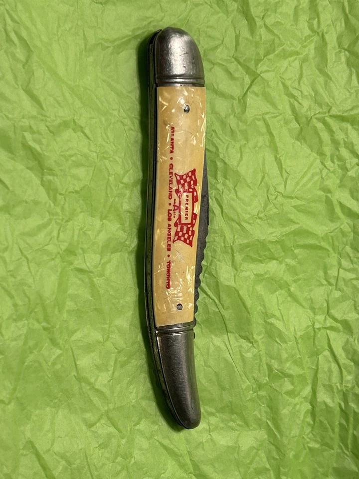 Cuchillo de Pesca Imperial EE. UU. De Colección Incrustación de Peces Hoja Dentada y Escalador Anuncio en Mango Foto 1 de 4