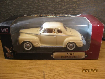 1/18 1941 PLYMOUTH EN MARFIL DE YATMING/ROAD CHAMPS #92398 Foto 1 de 4