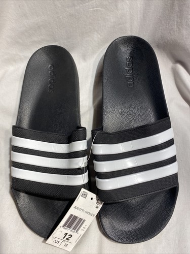 Sandali doccia Adidas da uomo bianchi e neri taglia 12 47