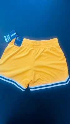 Nuevo DSG Niñas Talla M Amarillo Performance Shorts Foto 1 de 3