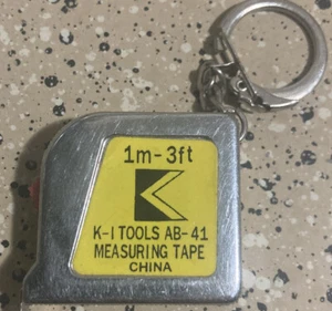 Vintage China K-1 TOOL AB-41 MEASURING Tape Measure Key Chain Fob Souvenir 3" 1M - Picture 1 of 3