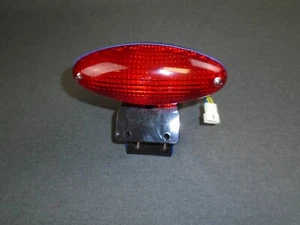 NUEVA GENERACIÓN APRILIA Mojito 125 99-01/Retro 50 2T 99-03 LUZ TRASERA AZUL ARRECIFE AP8127045 - Imagen 1 de 3