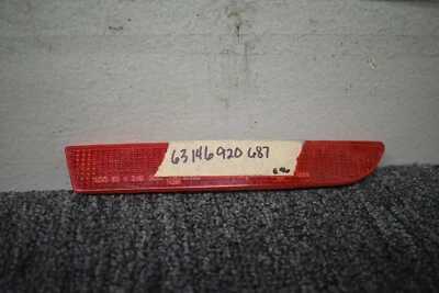 2004-2006 BMW 325CI REFLECTOR FACTORY OEM - Image 1 of 4