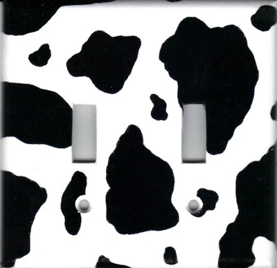 PLACAS Y ENCHUFES INTERRUPTORES DE LUZ DECORACIÓN HOGAR IMAGEN BLANCO Y NEGRO IMPRESIÓN VACA Foto 1 de 4