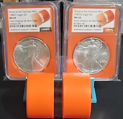 1986(S) & 1987(S) 1 oz Silver Eagle NGC MS69 Mint Orange Core With Mint Tube - Image 1 of 4