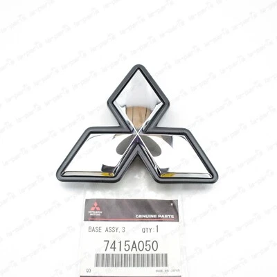 NEW GENUINE MITSUBISHI EVOLUTION 9 EVO IX FRONT EMBLEM  7415A050 - Image 1 of 4