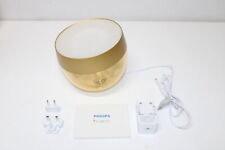 Philips Hue NEU Iris White and Color Ambiance Smart Table Light v4 [Gold] Mit Bl