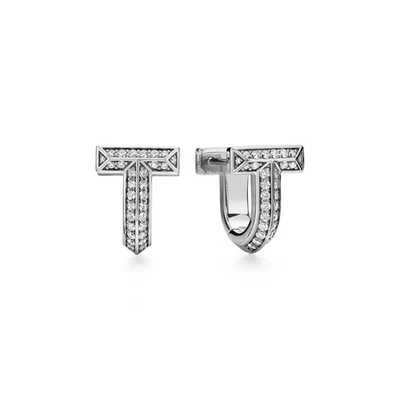 Auténticos aretes Huggie con pavé T1 de diamantes de oro blanco de 18 k de 0,28 quilates de Tiffany & Co. Foto 1 de 4